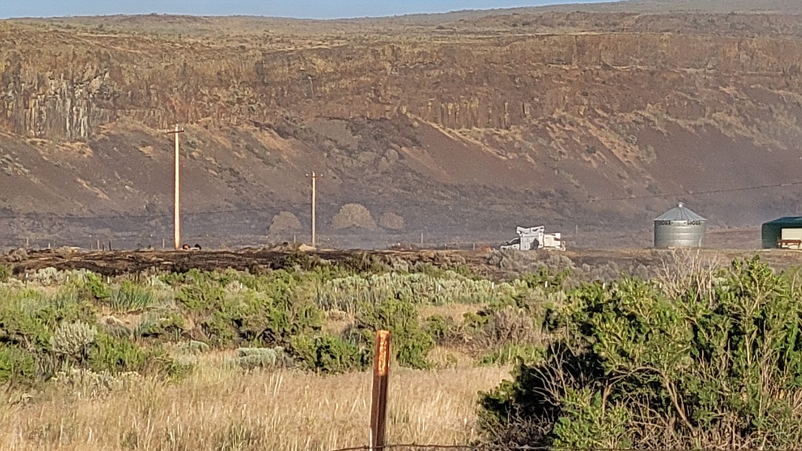 Charred grass and shrubs were about all that was left of the fire near Soap Lake at around 7:30 p.m. Tuesday. The fire had begun just a few hours earlier and firefighters were able to contain it quickly.