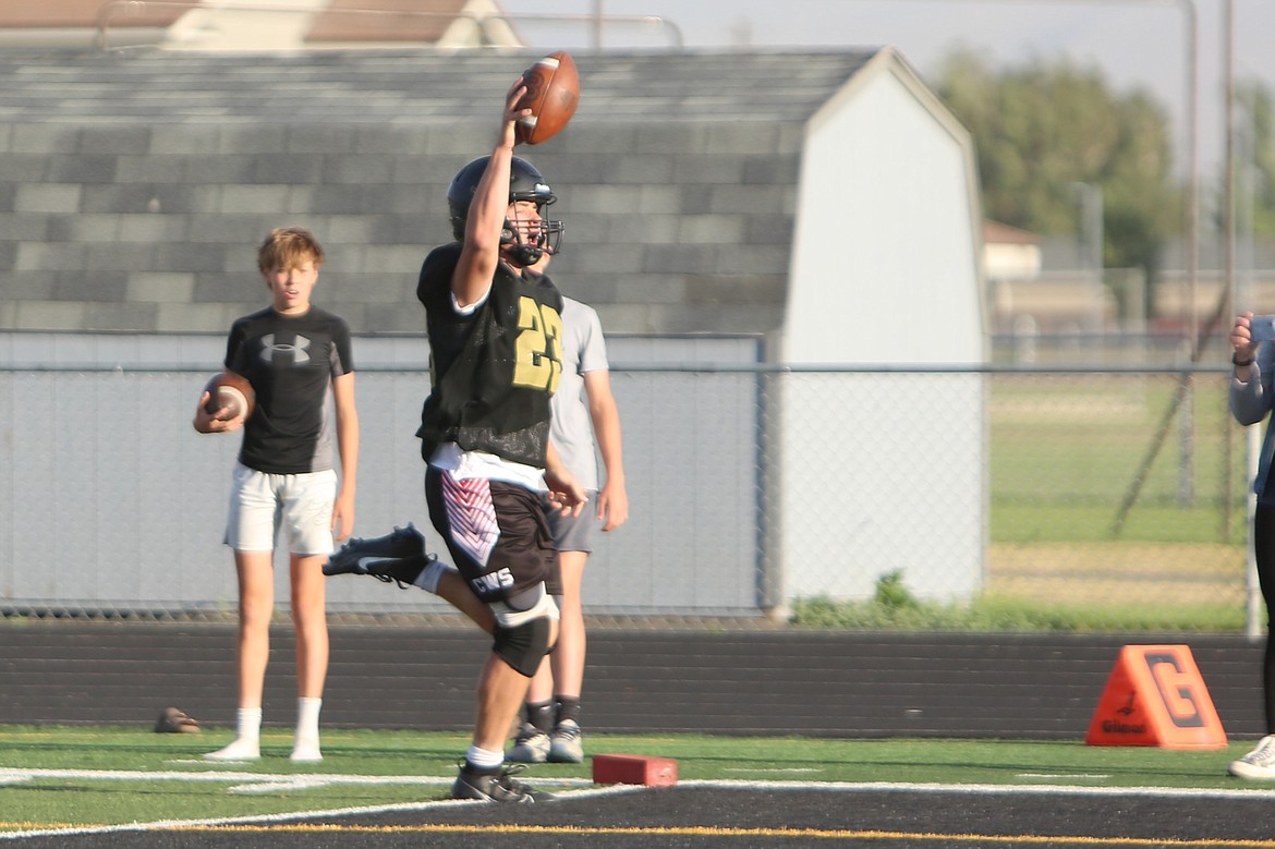 A Royal player celebrates after scoring a touchdown on a long run against Moses Lake at Tuesday’s scrimmage.