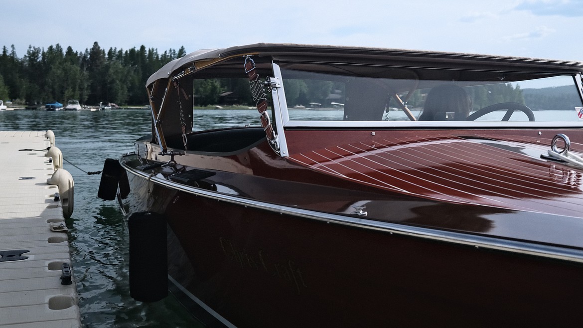 A 1930 Chris Craft 103 Roundabout sits docked at The Lodge at Whitefish Lake in Whitefish on June 7. (Adrian Knowler/Daily Inter Lake)