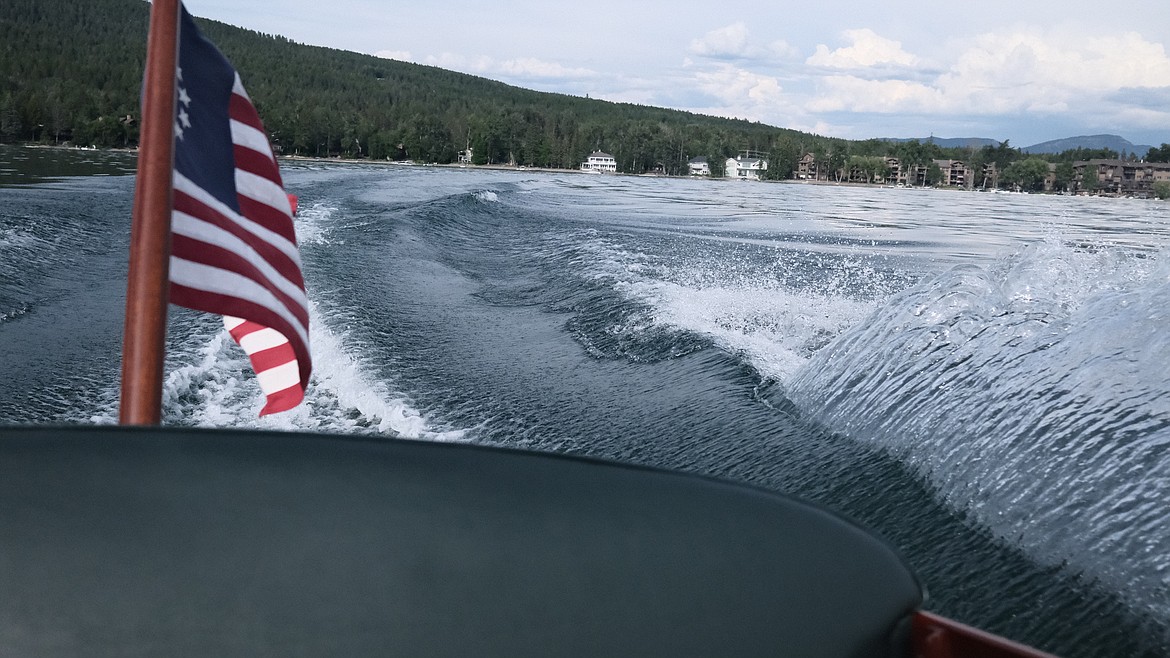 A classic motorboat cruises Whitefish Lake on June 7. (Adrian Knowler/Daily Inter Lake)