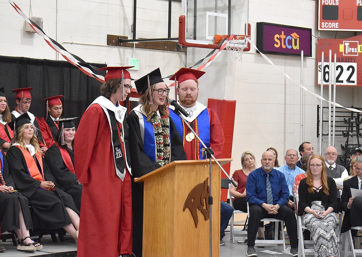 From left: Co-valedictorians David Hinkle, Taylor Galbreath and Hunter Cameron take turns speaking at Lind-Ritzville High School’s graduation June 3.