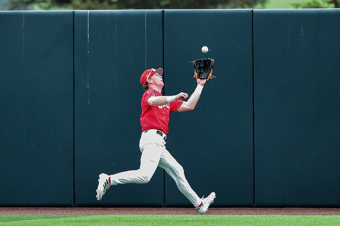 Glacier centerfielder Kingston Liniak (20) tracks down a fly ball hit to the warning track in the seventh inning against the Missoula Paddleheads at Glacier Bank Park on Friday, June 16. (Casey Kreider/Daily Inter Lake)