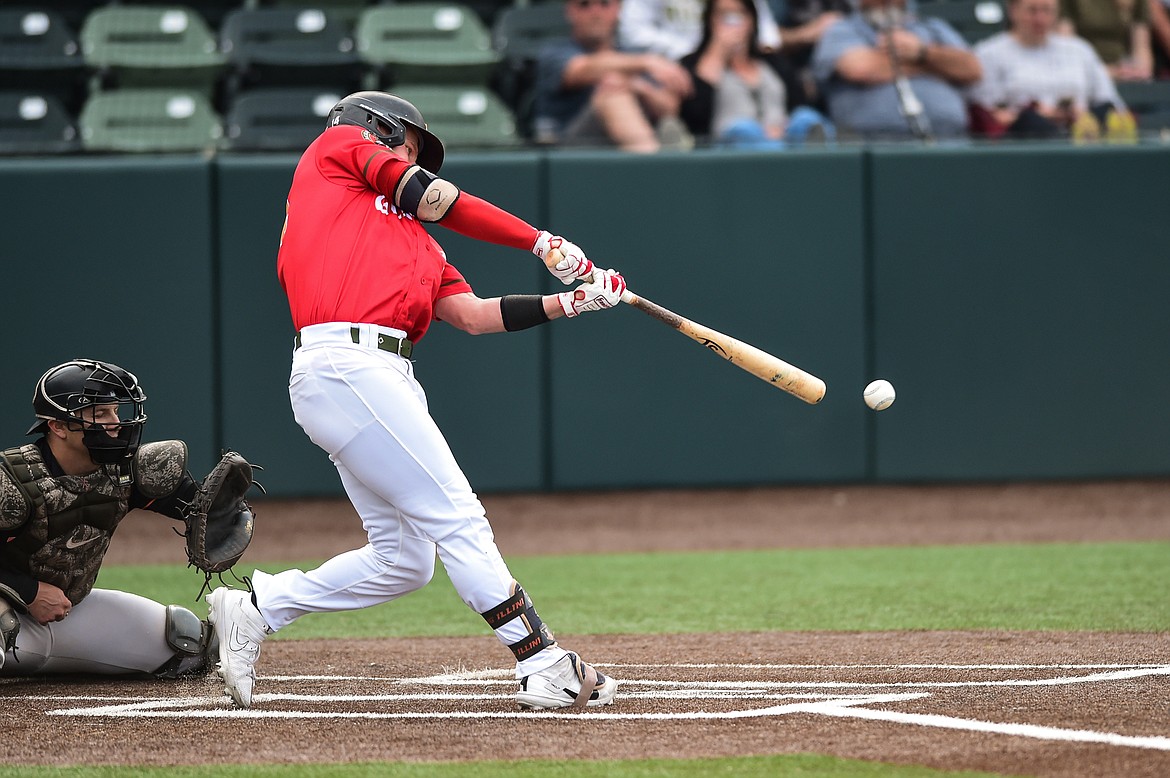 Glacier's Jackson Raper (14) singles in the first inning against the Missoula Paddleheads at Glacier Bank Park on Friday, June 16. (Casey Kreider/Daily Inter Lake)