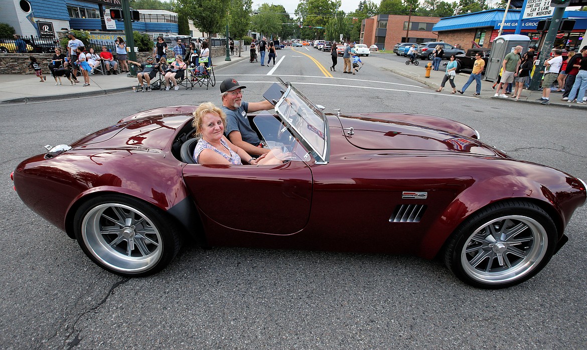 Chris and Suzanne Zabriskie ride in their 1965 Shelby Cobra in Car d'Lane.