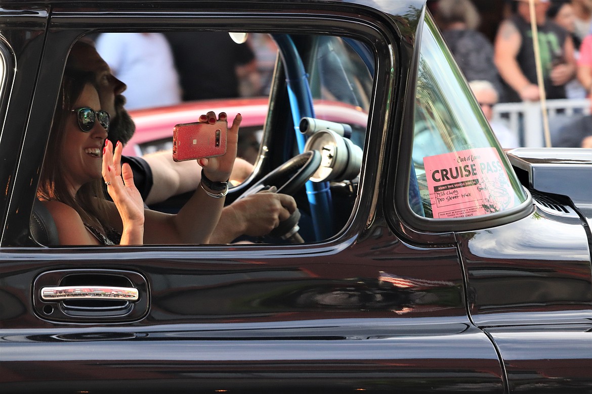 A Car d'Lane passenger enjoys the cruise.