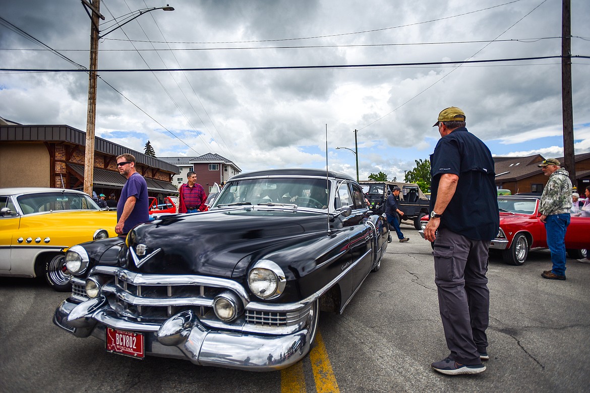 Troy Neater parks his 1951 Cadillac that he found in a barn with 34,000 miles on it at The Big Shindig outside The DeSoto Grill in Kalispell on Saturday, June 17. The Big Shindig features a wide range of classic and custom vehicles as well as live music, barbeque, beer and wine and a pin-up polar plunge. Hosted the Glacier Street Rod Association and the Desoto Grill, money raised benefits Mikayla’s Miracles and Blessings Foundation. (Casey Kreider/Daily Inter Lake)