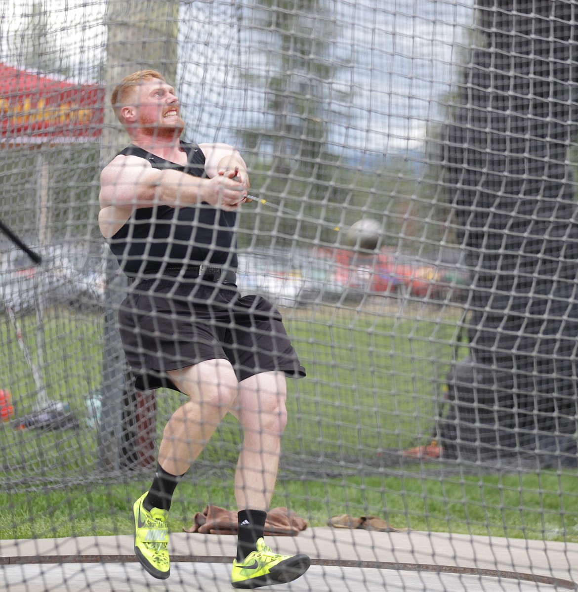 JASON ELLIOTT/Press
Brock Eager, who trains at the Iron Wood Throws Center, winds up for an attempt during the men's hammer throw in the seventh Iron Wood Throws Classic on Saturday in Rathdrum. Eager won the event with personal best 251 feet, 3 inches.