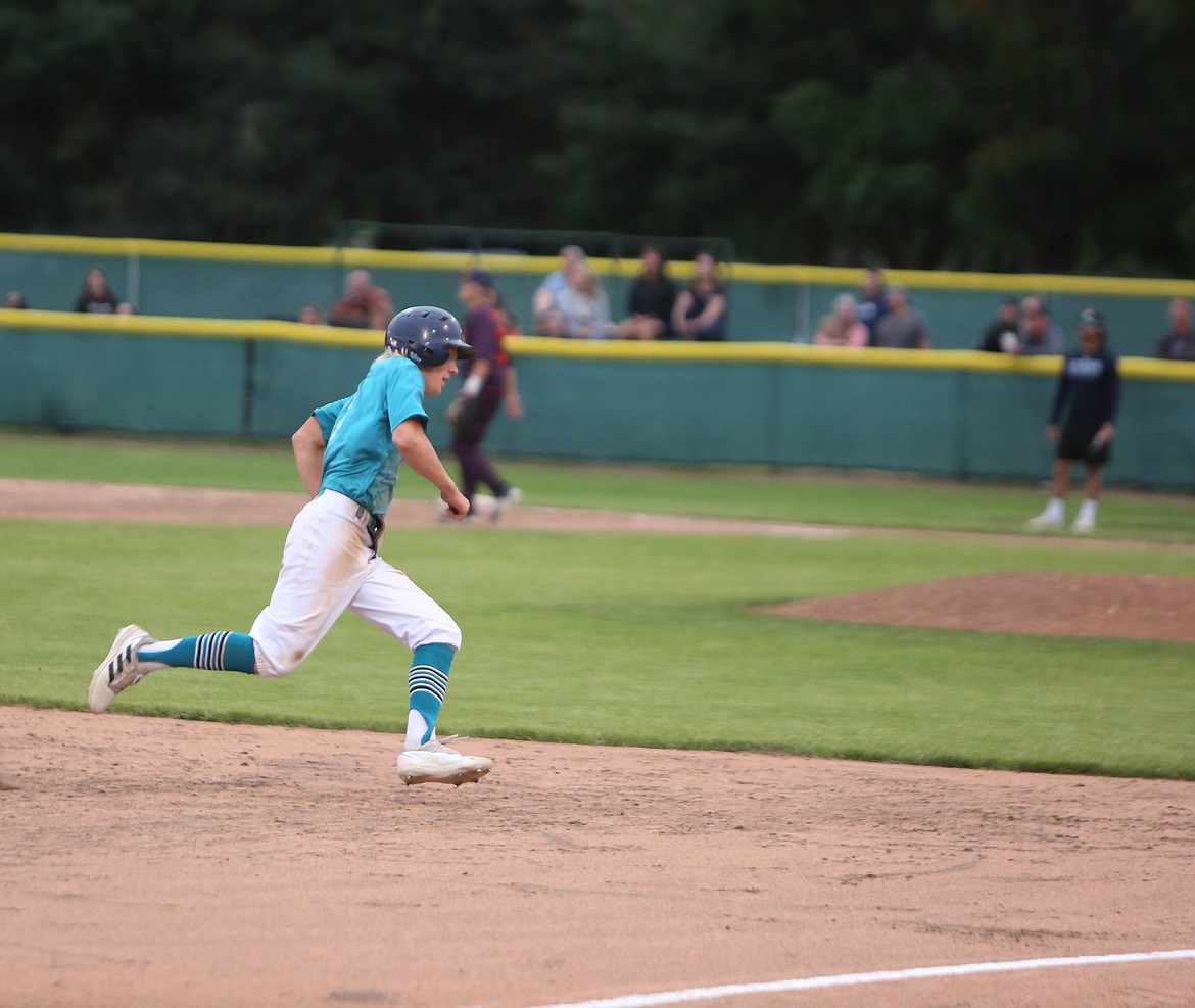 River Dog left fielder Willem Jansen rounds third base against Penticton on Friday.