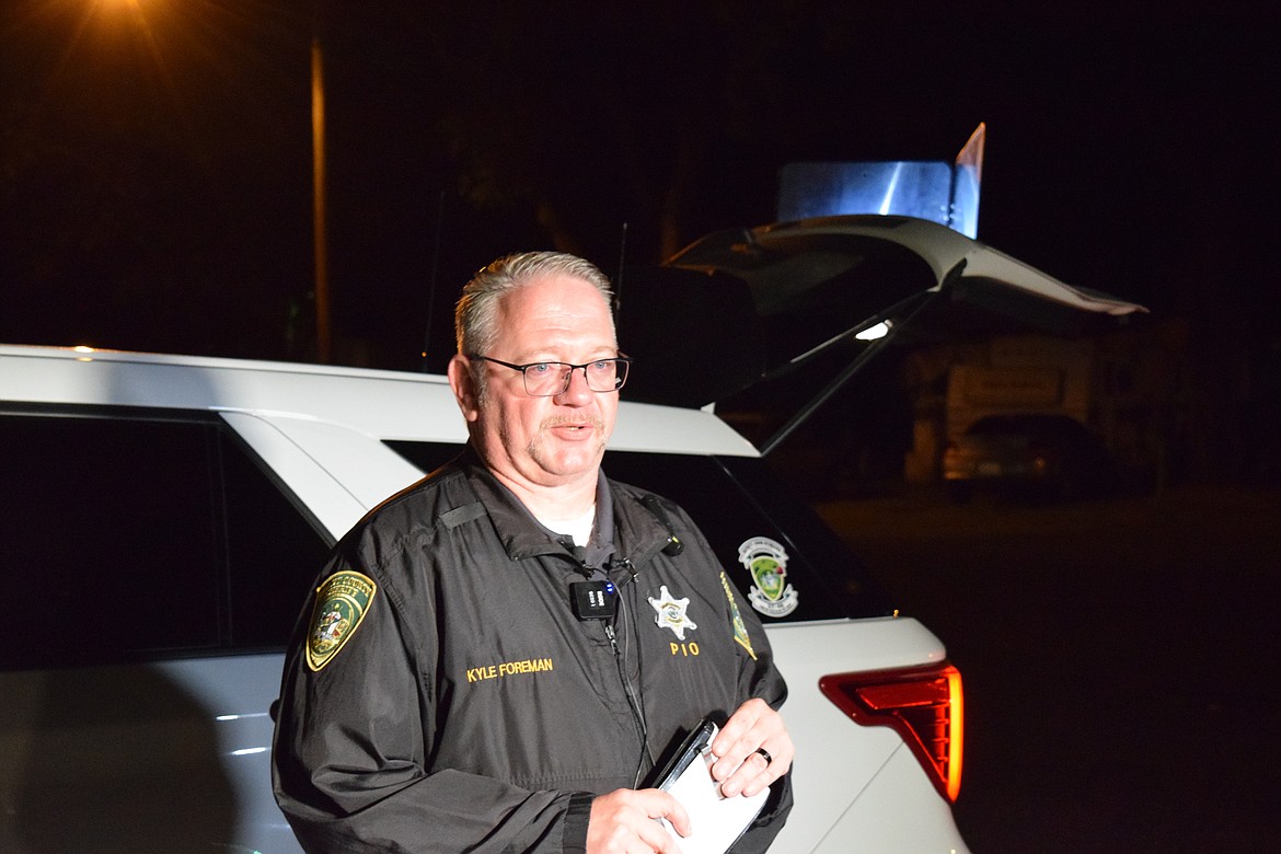 Grant County Sheriff's Office Public Information Officer Kyle Foreman speaks at a press conference held at the fire station in George at 11:30 p.m. Saturday evening. Foreman said an investigation into a shooting at The Gorge Amphitheatre campground is ongoing.