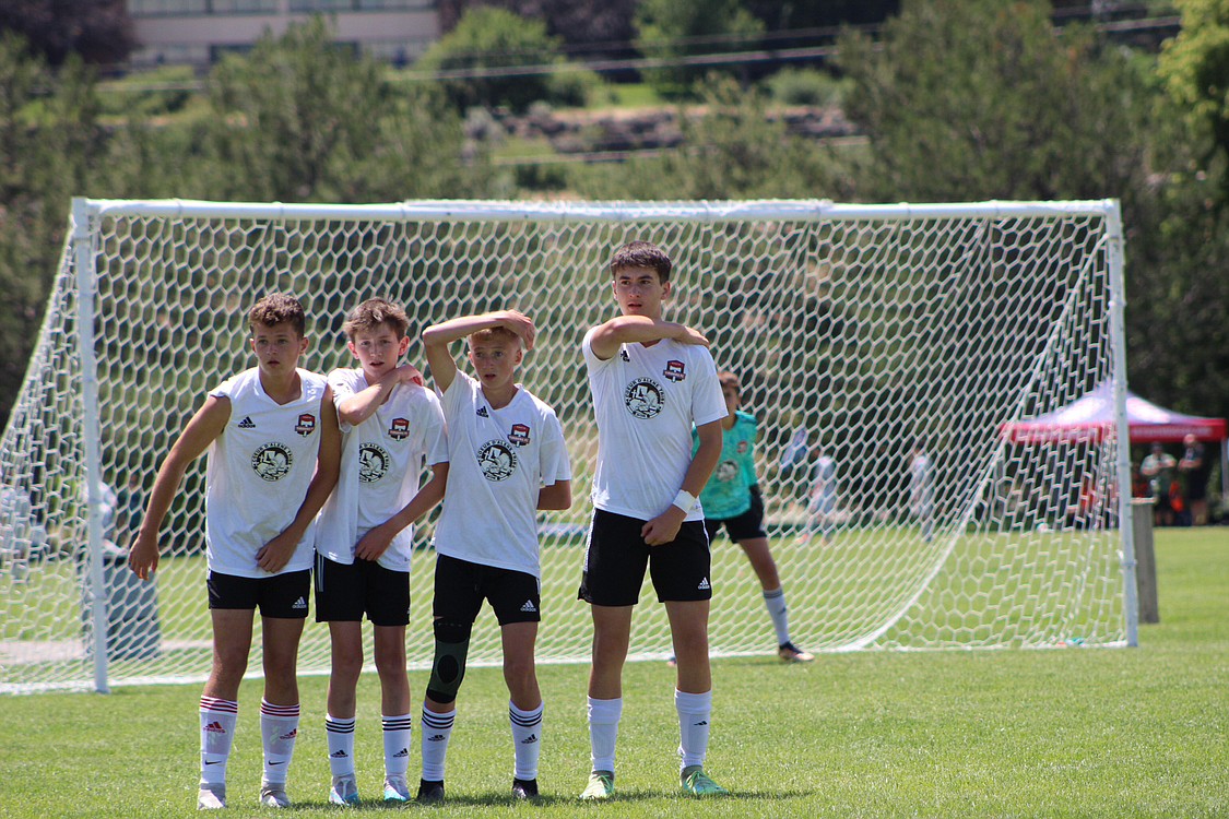 Photo by LAURA TAYLOR
Timbers FC North 09 boys players create a wall for a free kick from the Colorado Rapids South on Sunday at the US Youth Soccer Far West Presidents Cup at the Simplot Sports Complex in Boise. From left are Ayden Cragun, Jake Melun, Rowan Wyatt and Isaac Lowder, with keeper Grant Johnson in the background.