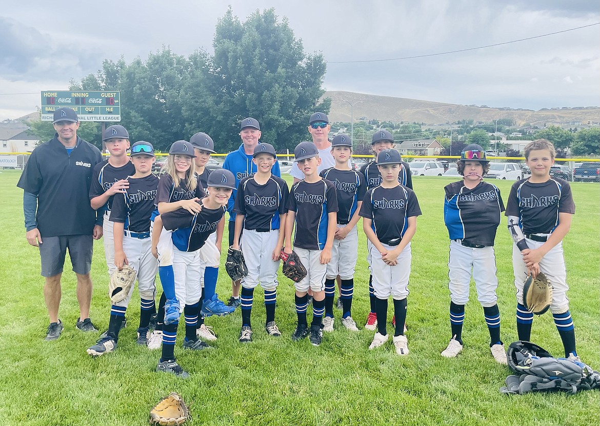 Courtesy photo
The 12U North Idaho Sharks select baseball team took third place last weekend at the Richland All-Star Kickoff tournament in Richland, Wash. From left are manager Dave Everson, Trent Lilyquist, Bryce Petrella, Jack Kreiss, Blake Anderson, Cooper Fordham, coach Jeff Kreiss, Kyle Everson, JJ Larson, coach Jon Larson, Rixton Bateman, Caleb Brumbach, Nash Russell, Kovack Dolan and Clay Larwin.