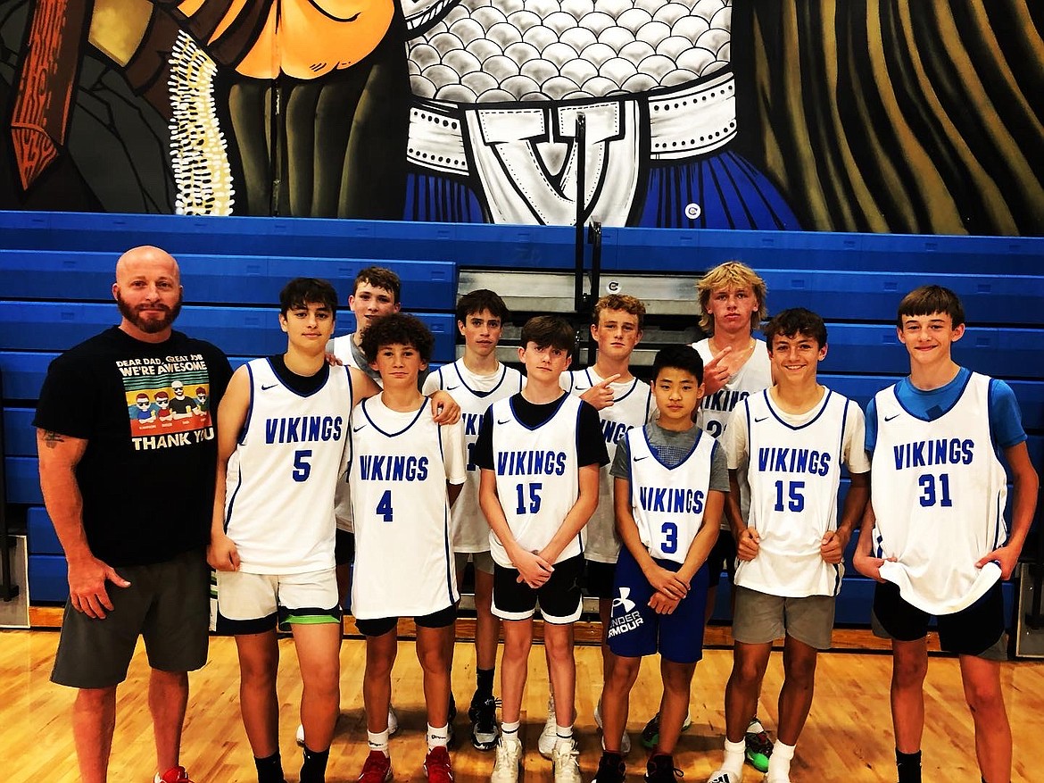 Courtesy photo
Coeur d'Alene High won the freshman boys division at the third annual Coeur d'Alene Summer Shootout last weekend. From left are coach Jeff Rupp, Thomas Taylor, Colin Wright, Brett Johnson, Paxon Rasor, Cole Nelson, Hunter Gray, Peyton Pool, Tanner Stern, Ean McClellan and Ryland Braga.