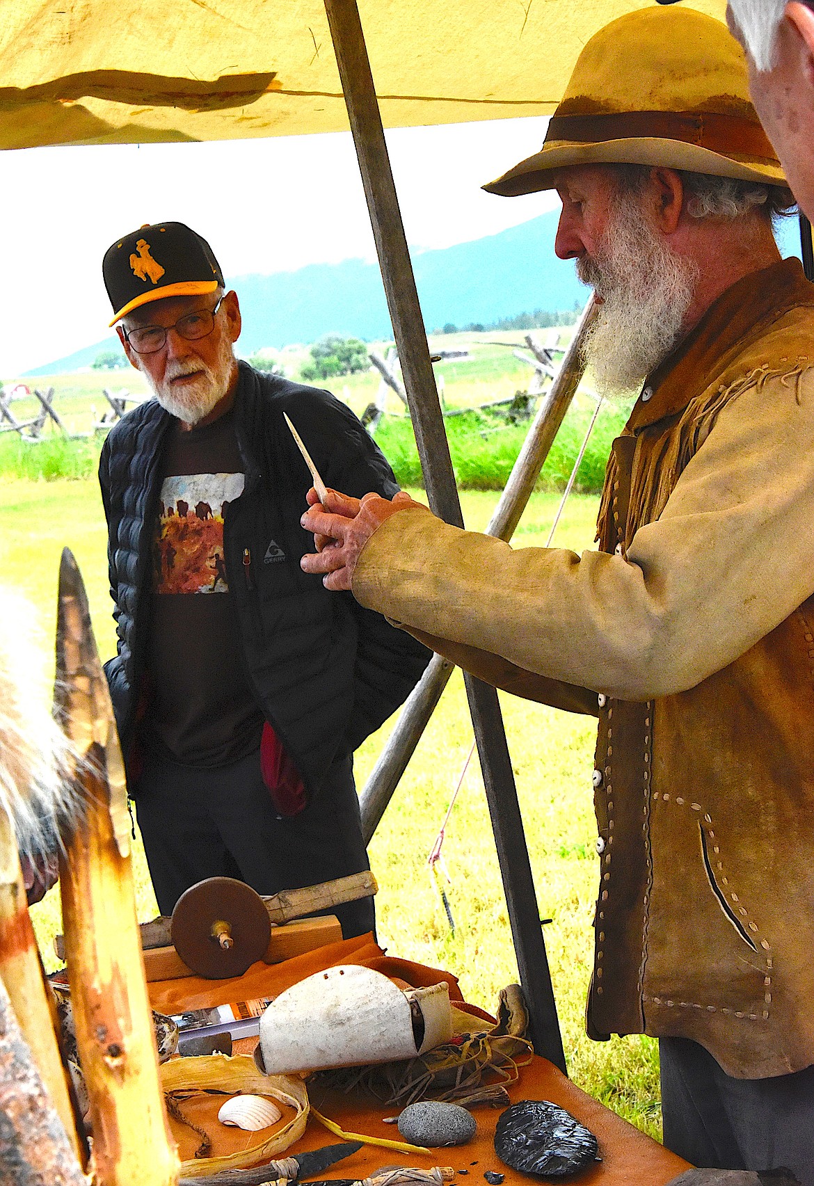 Gary Steele displays a sharpened deer antler that can be used as a knife at the Fort Connah Rendezvous. (Berl Tiskus/Leader)