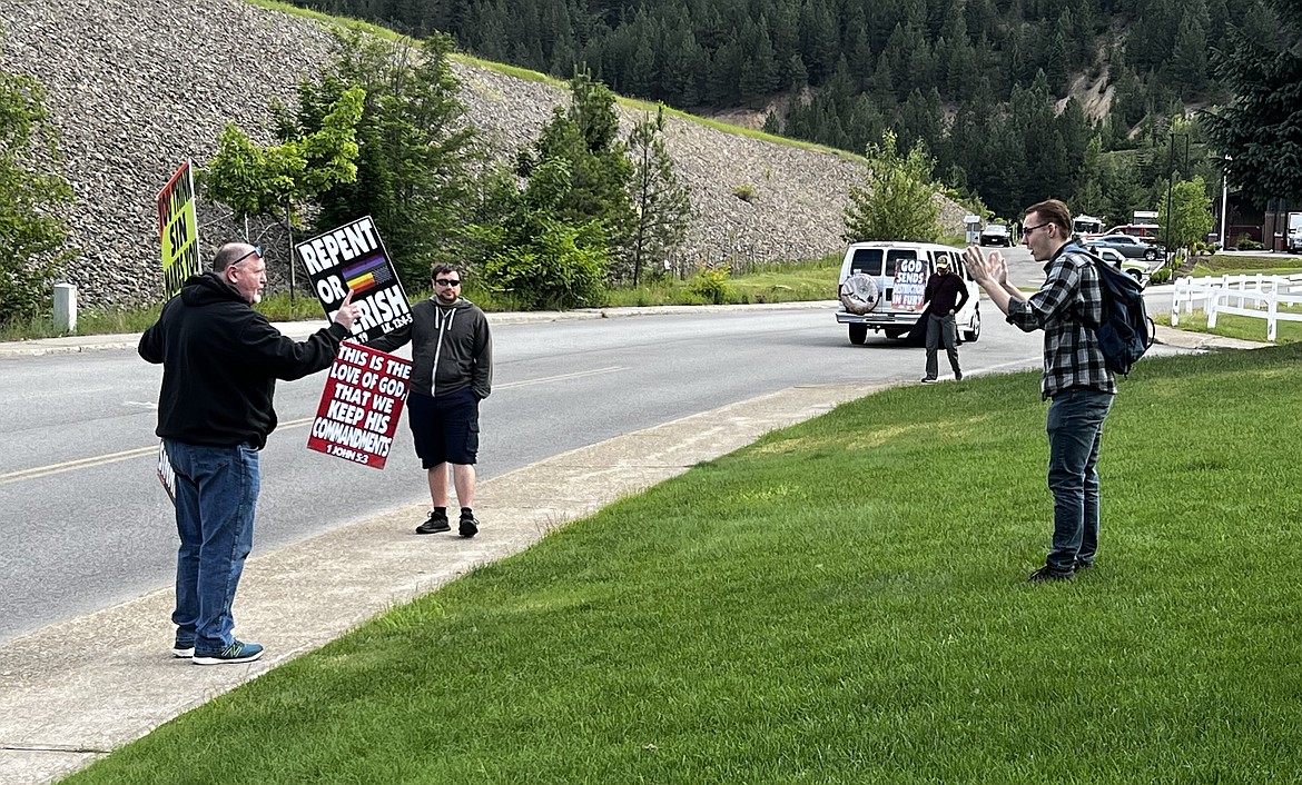 Shoshone County resident Dayton Wiksten engaged in a brief discussion with the picketing members of the Westboro Baptist Church on Monday morning outside of the Kellogg School District office. The man in the black hooded sweatshirt pointing is Timothy Phelps, the son of WBC founder Fred Phelps.
