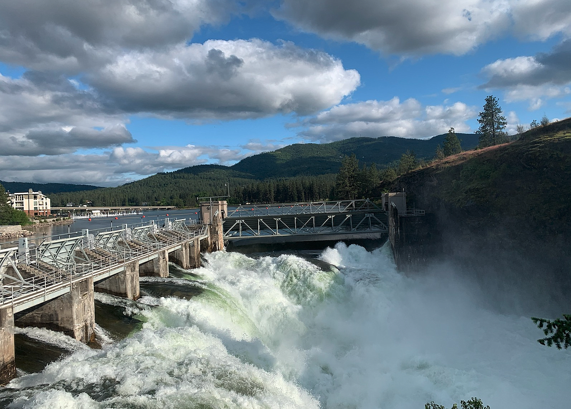 Spokane River recreation access opens today in Post Falls between the Spokane Street Bridge and the boater safety cables just upstream from the Post Falls Dam, pictured here. Avista announced Monday that river flows have dropped enough to allow summer operations at the hydroelectric facility.