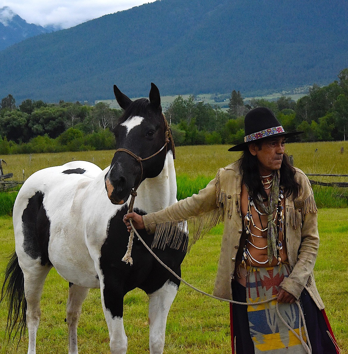 Jocko Hendrickson stands with his paint horse, Storm Dancer. (Berl Tiskus/Leader)