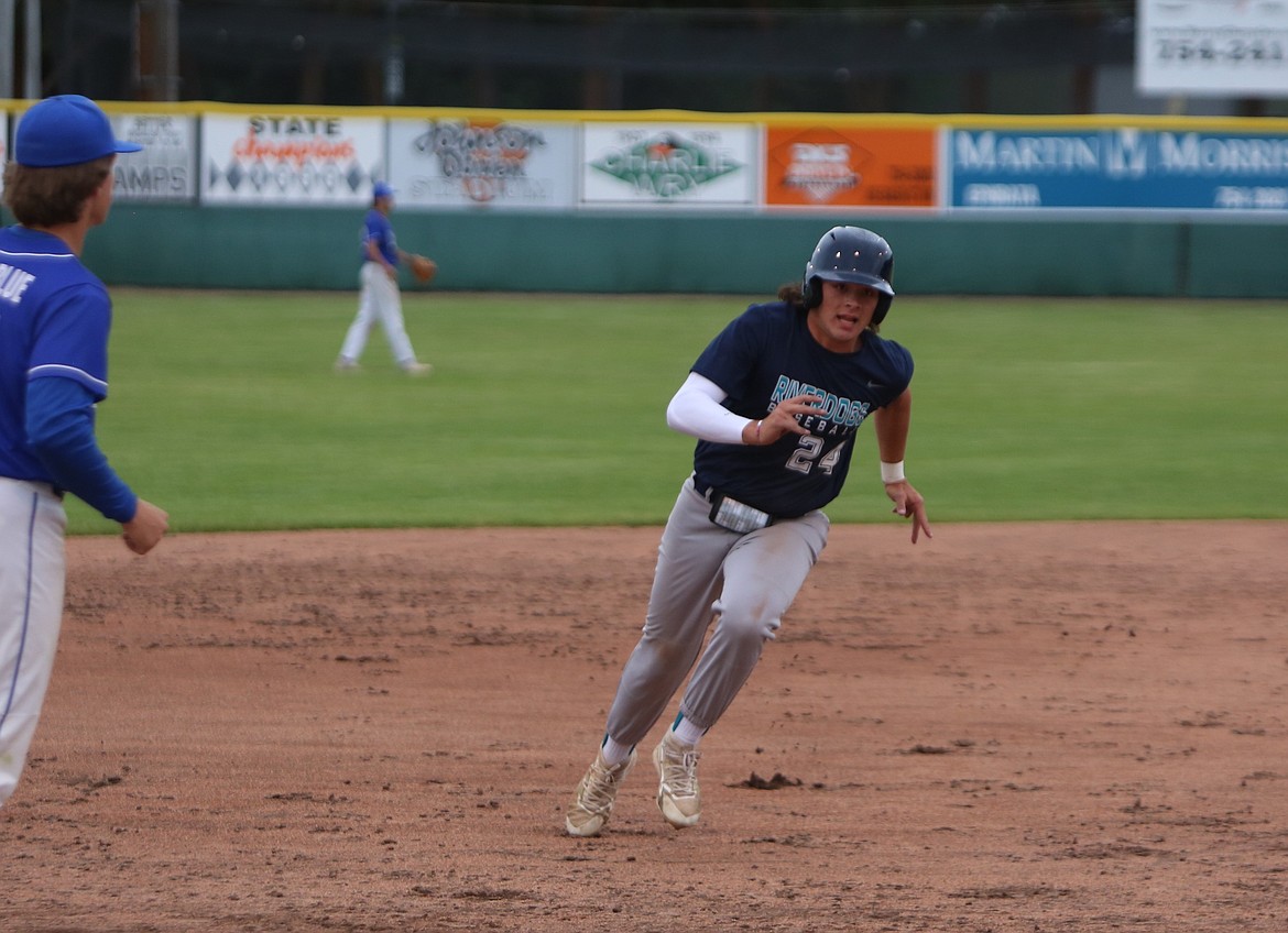 River Dog first baseman Hayden Meek runs toward third base against North Spokane on Saturday evening.