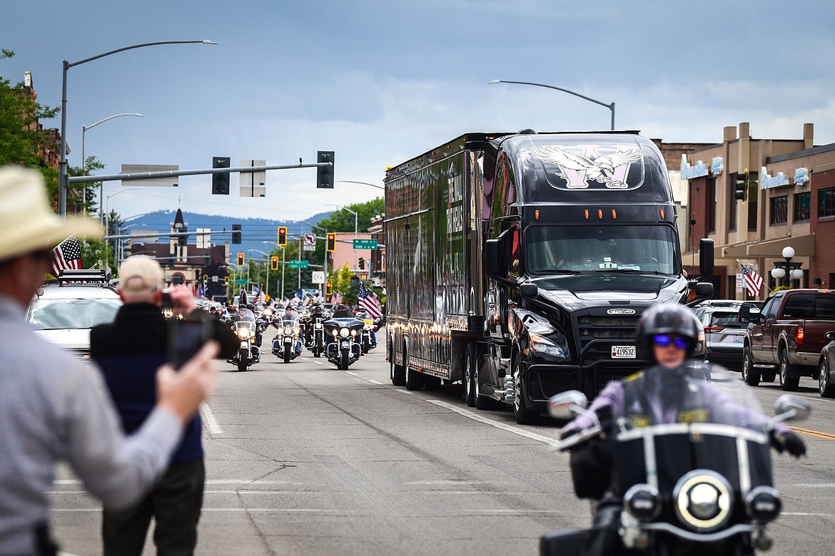 Over 300 Patriot Guard Riders, first responders, Two Bear Air Rescue and the A.L.E.R.T. rescue helicopter escort the tractor-trailer carrying The Wall That Heals through downtown Kalispell on Tuesday, June 20. (Casey Kreider/Daily Inter Lake)