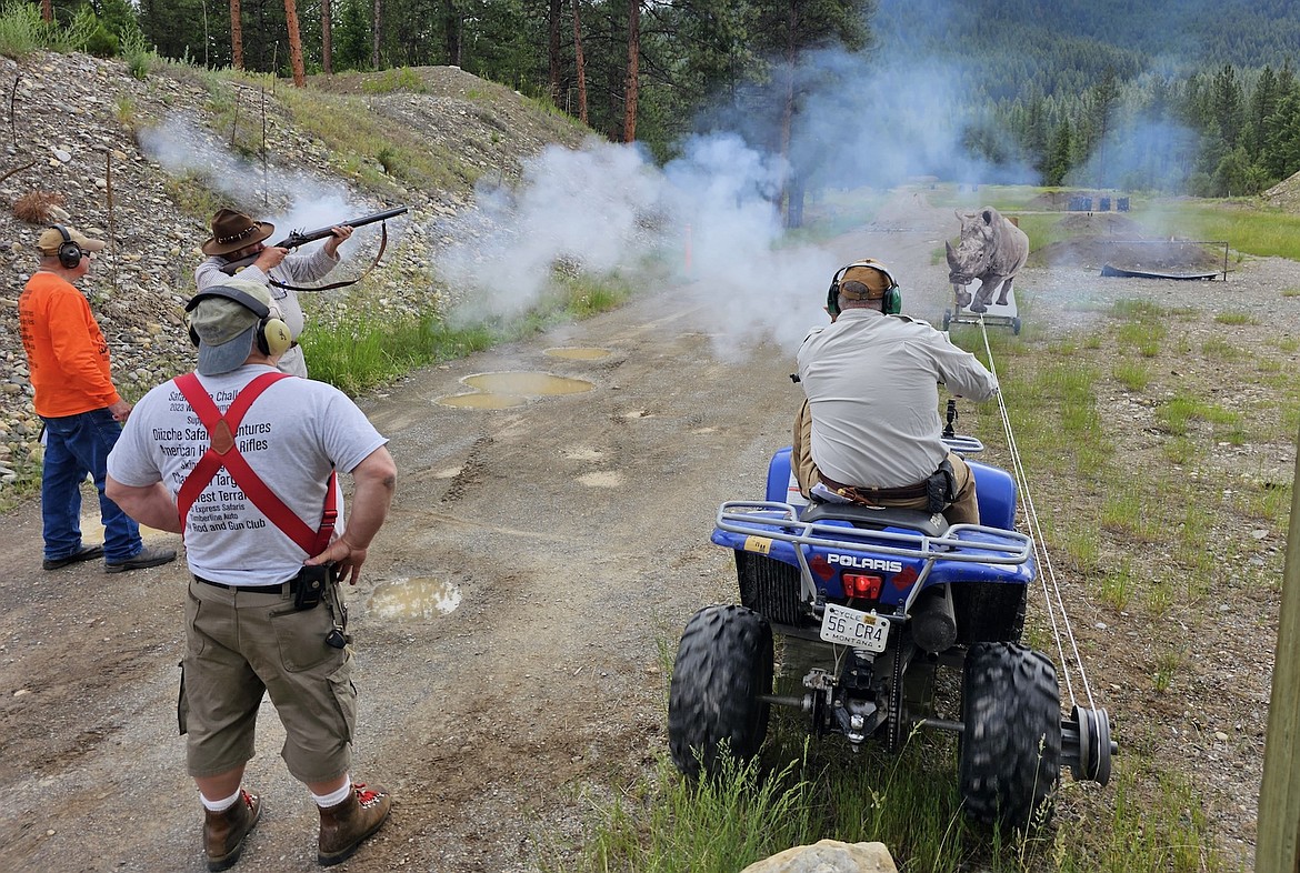 Flathead Valley’s Gene Gordner fires his custom, self-built 10 bore double rifle at a charing rhinoceros target at the Safari Rifle Challenge. (Courtesy photo)