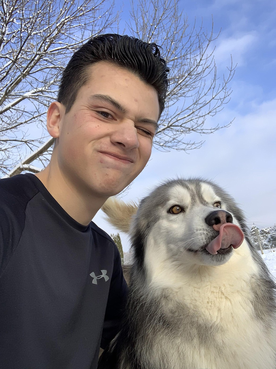 Caleb Perez spending time with his dog, Aura. Perez said Aura can be a bit of a handful, but he loves her all the same and enjoys getting time with her.