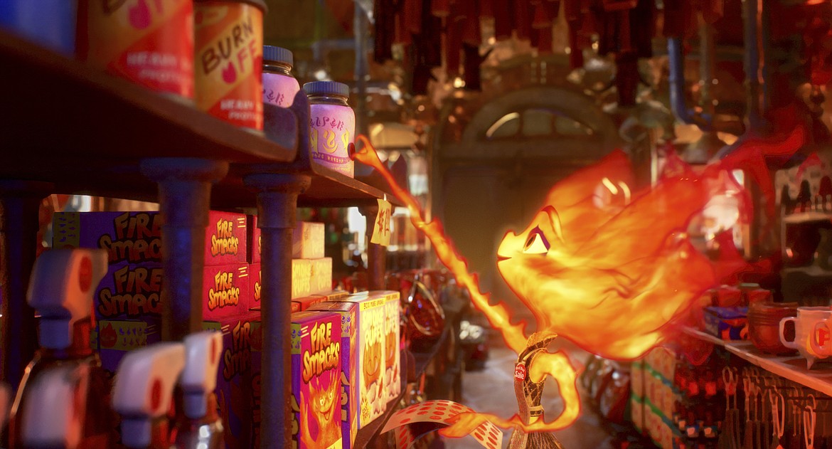 This image released by Disney/Pixar Studios shows Ember, voiced by Leah Lewis, in a scene from the animated film "Elemental."