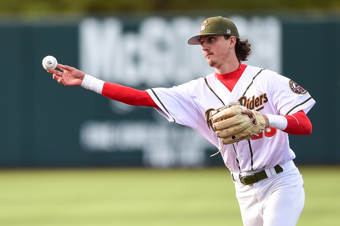 Glacier second baseman Mason Dinesen (23) throws to first for an out in the second inning against the Great Falls Voyagers at Glacier Bank Park on Wednesday, June 21. (Casey Kreider/Daily Inter Lake)