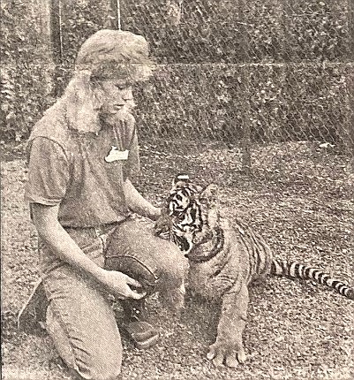 Silverwood animal keeper Kelly Thornton with Tigger, a 7-month-old Bengal tiger, in 1988.