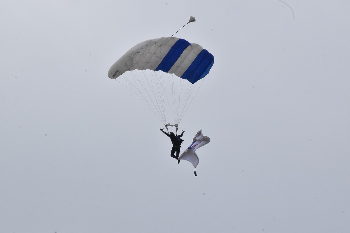 Soldiers represented the U.S. Army in this demonstration as they floated in for a landing via parachute at the airshow.