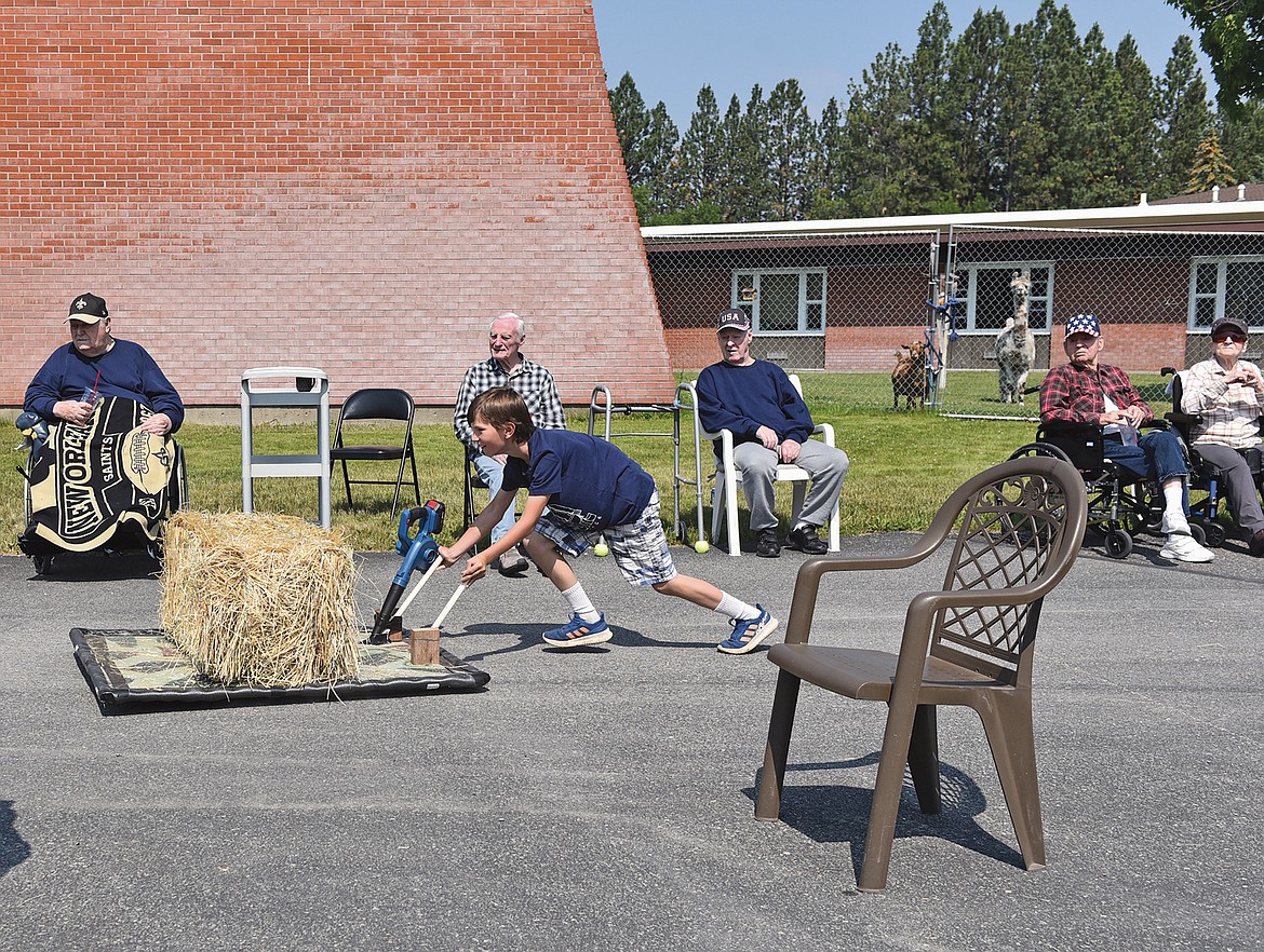 Kids race their hovercrafts while the veterans from the home watch. (Julie Engler photo)