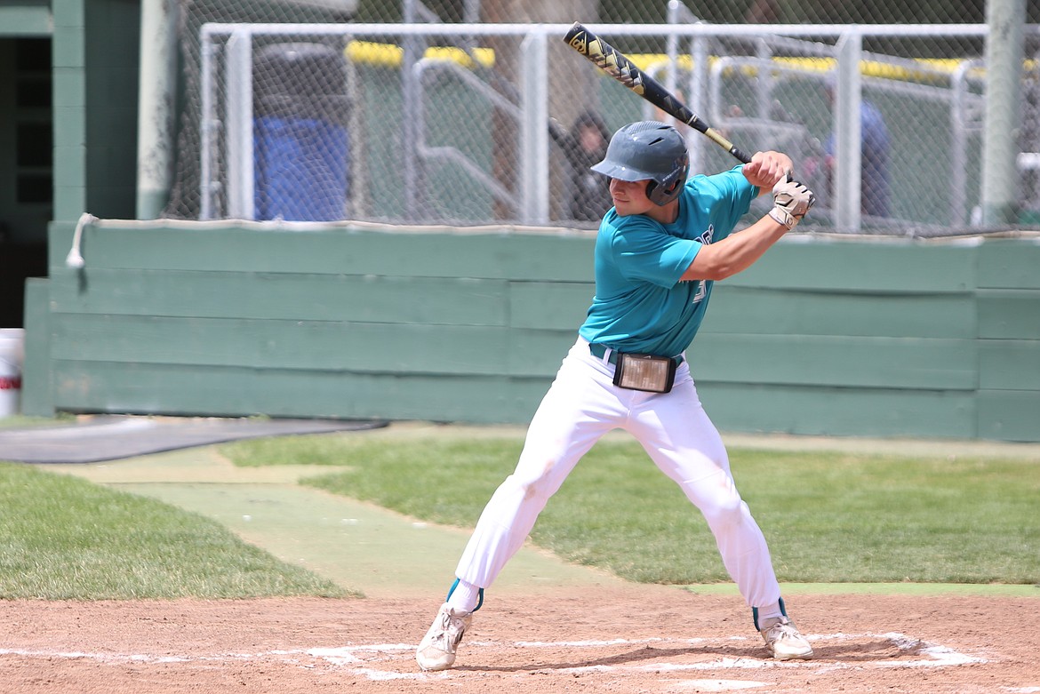 River Dog second baseman Zane Harden stands in the batter’s box waiting for a pitch against the North Spokane Dodgers on Sunday.