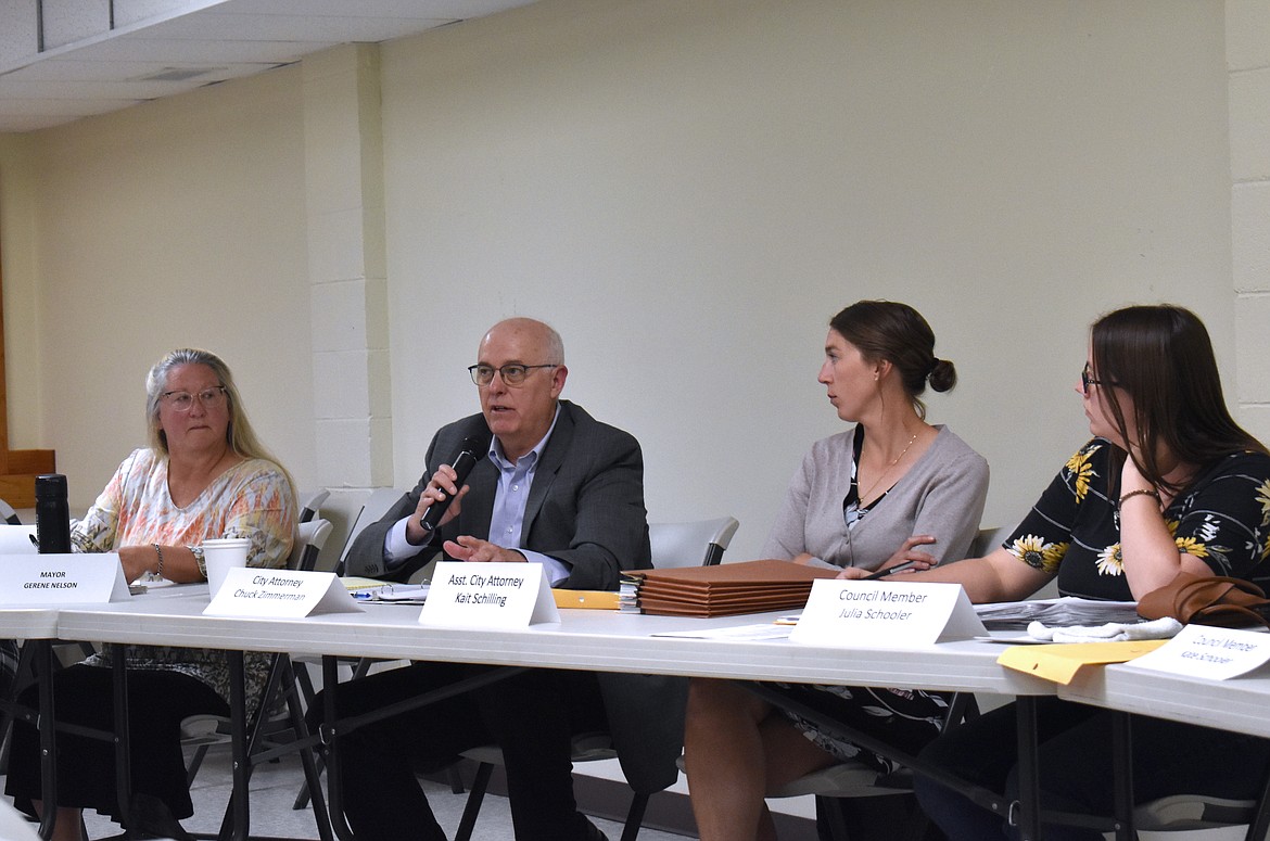 George City Attorney Chuck Zimmerman addresses the George City Council about a proposed park district Tuesday. From left: Mayor Gerene Nelson, Zimmerman, Assistant City Attorney Kait Schilling and Council Member Julia Schooler.