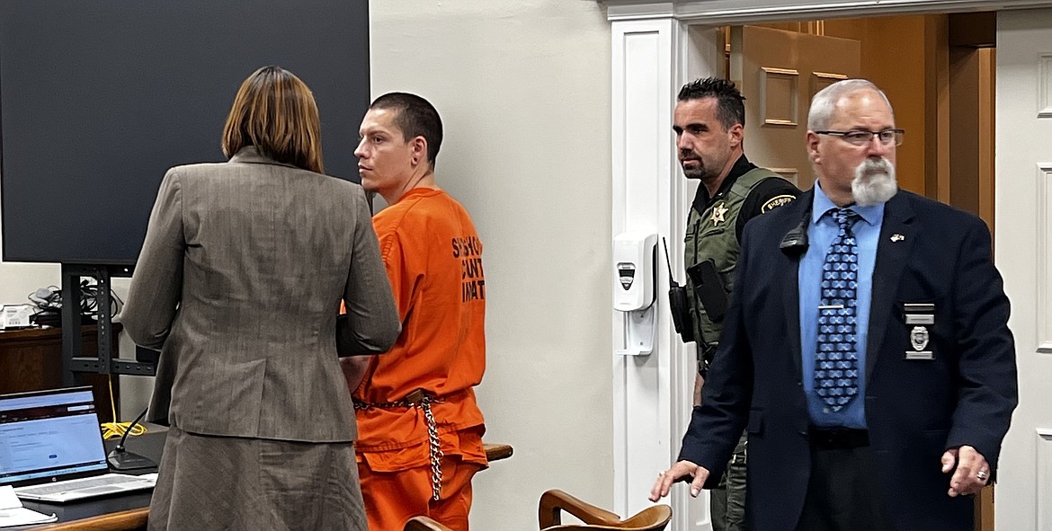 Accused murderer MajorJon Kaylor is remanded into the custody of law enforcement following his first appearance in court on Tuesday in Wallace. Shoshone County Prosecuting Attorney Benjamin Allen will not be seeking the death penalty for Kaylor's alleged crimes.