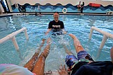Kids take 'The World's Largest Swimming Lesson'
