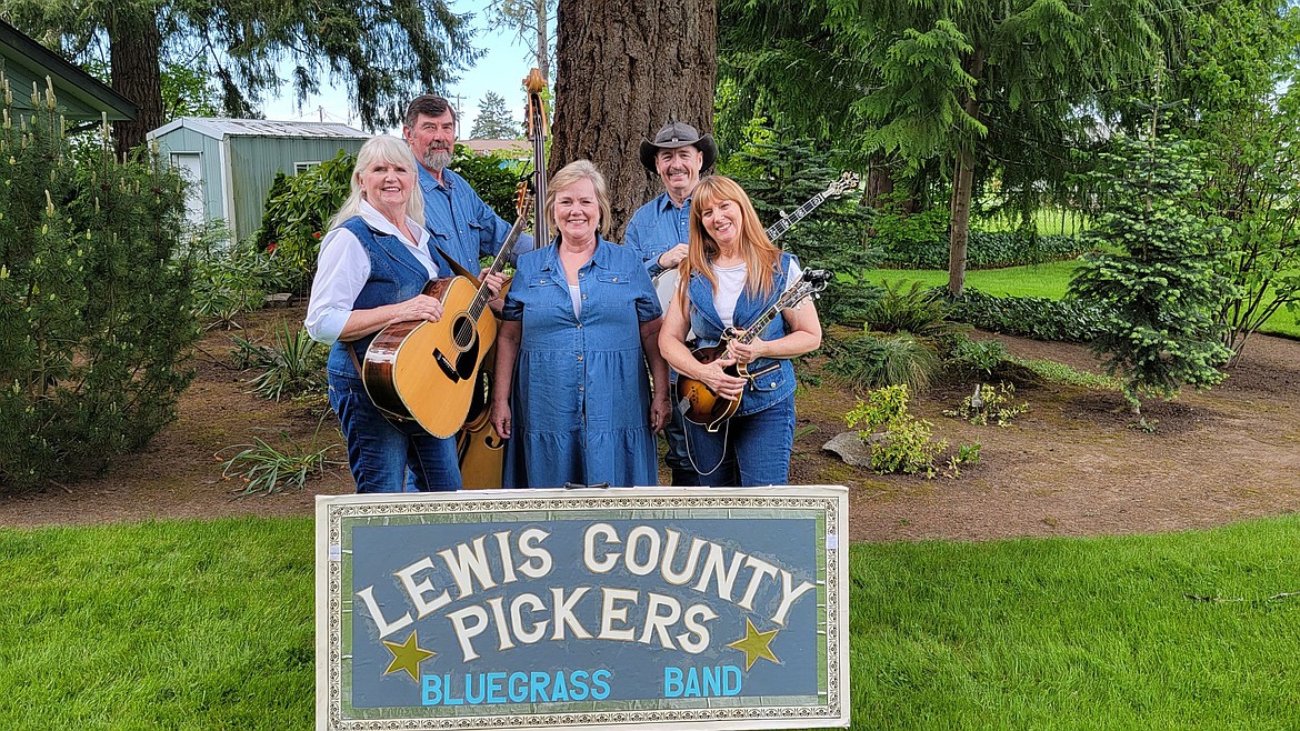 The Lewis River Pickers will be at Wilson Creek’s first Bluegrass in the Park this weekend. From left: Merry Hart, Fred Hart, Becky West, Richard Weeks and Monique Larsen.