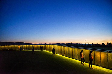 Visitors pay their respects at The Wall That Heals at the Glacier High School soccer fields on Thursday, June 22. (Casey Kreider/Daily Inter Lake)
