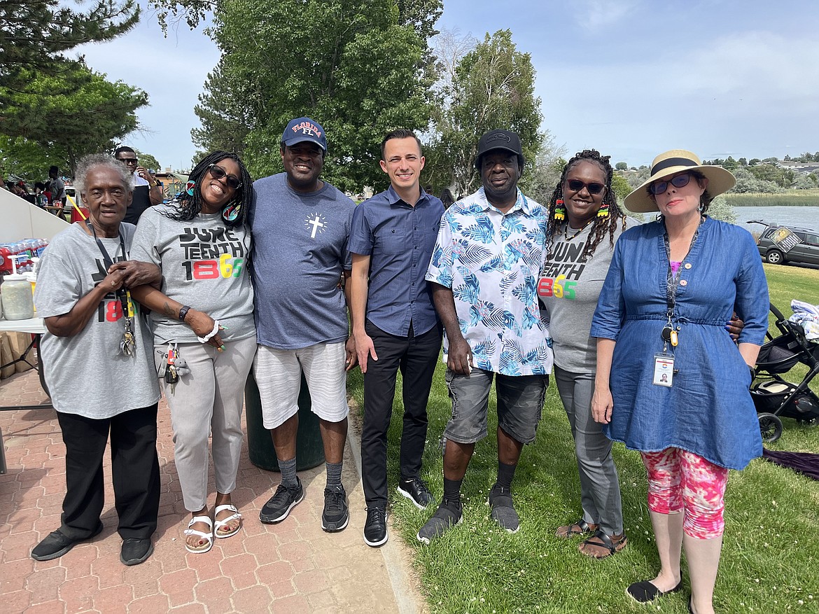 Members of the Moses Lake MLK Committee and the Moses Lake Museum of Art pose for a photo in McCosh Park, where the Juneteenth celebration was held on Saturday.