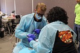 Volunteers provide free dental care