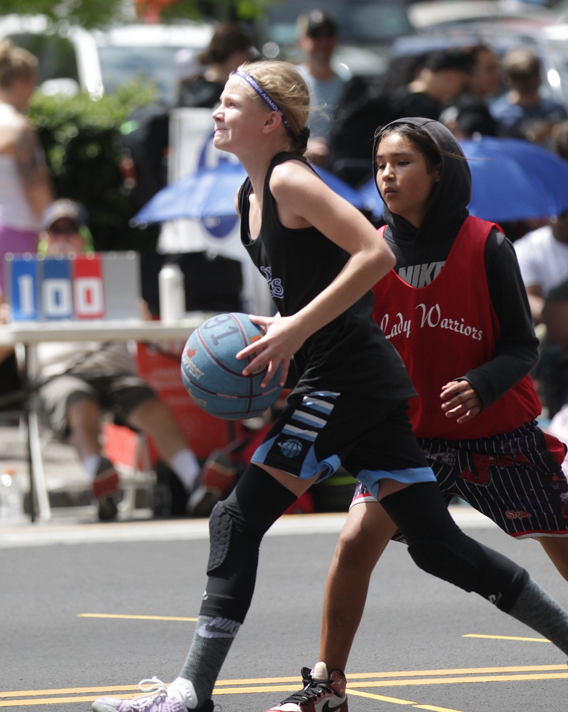 MARK NELKE/Press
Brynlee Johnston of the Cd'A Lakers takes it to the basket Saturday at Hoopfest in downtown Spokane.