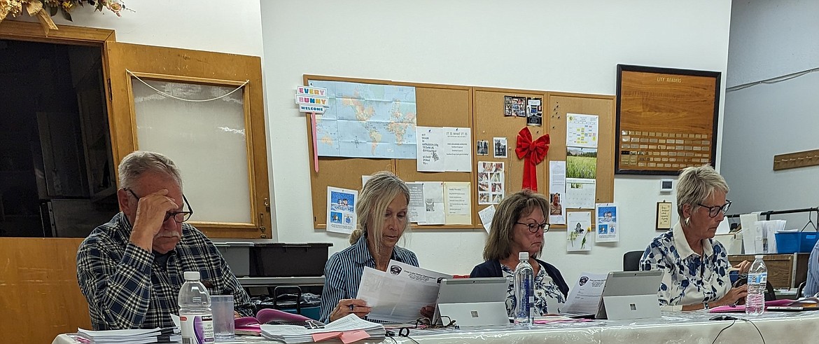 Soap Lake City Council members Allen DuPay, Karen Woodhouse, Kat Sanderson and Kayleen Bryson discuss Council business during Wednesday’s meeting at the Soap Lake Community and Senior Center.