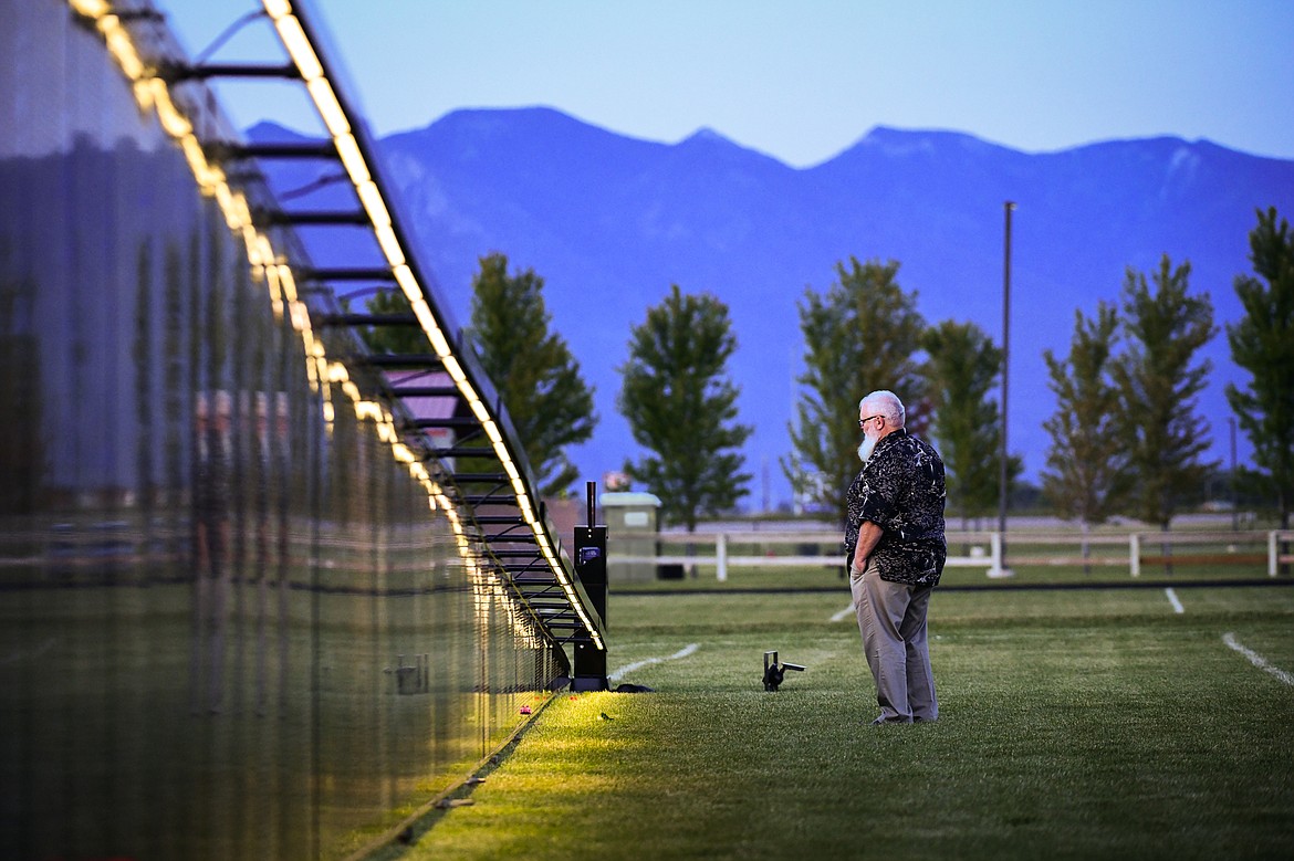 Chris Baker, of Columbia Falls, pays his respects at The Wall That Heals at the Glacier High School soccer fields on Thursday, June 22. (Casey Kreider/Daily Inter Lake)