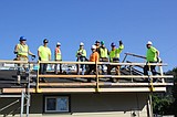 Volunteers help put new roof on Superior's Kingdom Hall