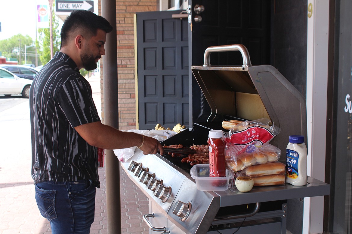 Danny Cuevas, owner of the Supreme Lookz barber shop in Moses Lake, said he uses events like a hot dog feed to get new customers and thank existing ones.