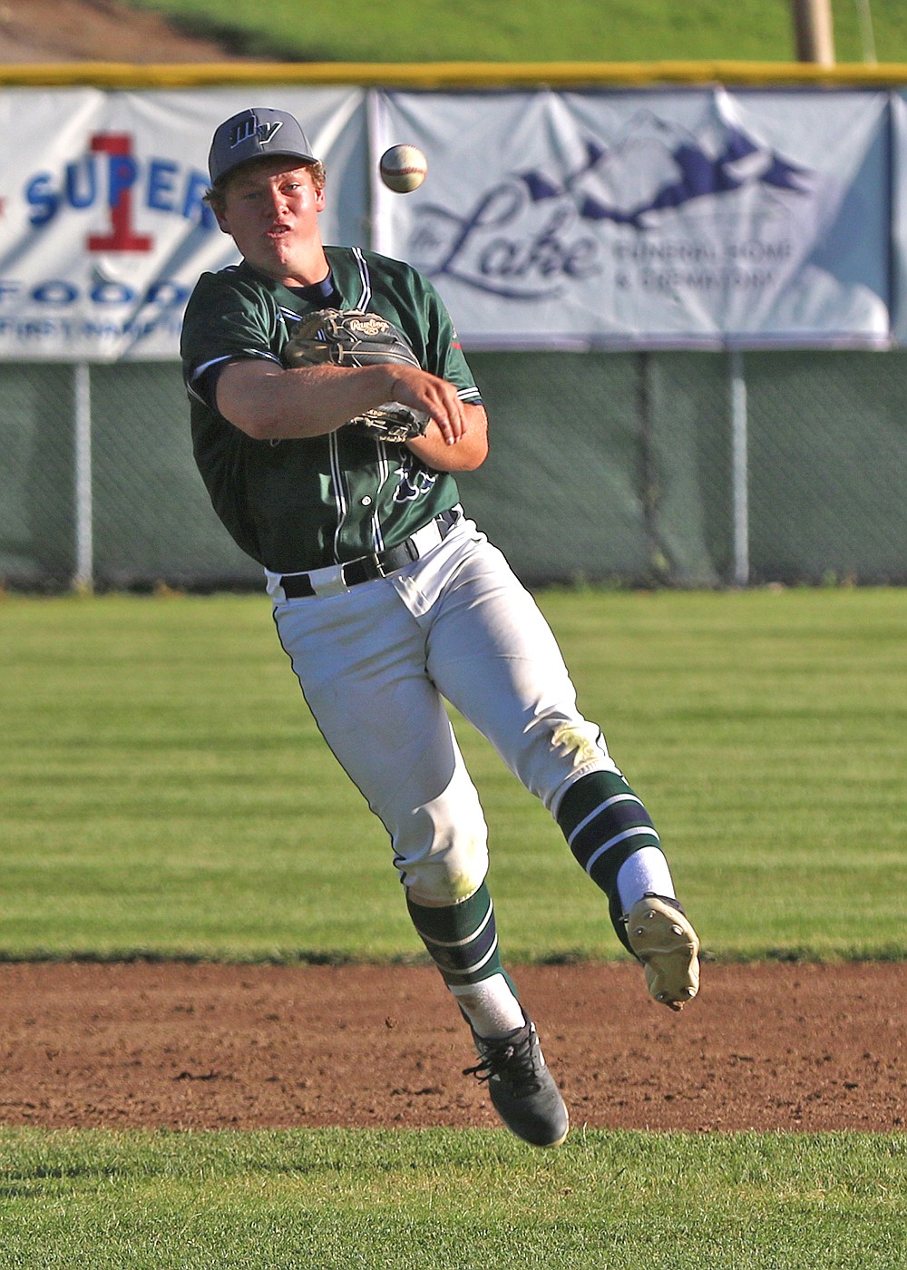 Shortstop Wyatt Wadsworth fields a ball to first in last Tuesday's Mission Valley Mariners home game. (Bob Gunderson photo)