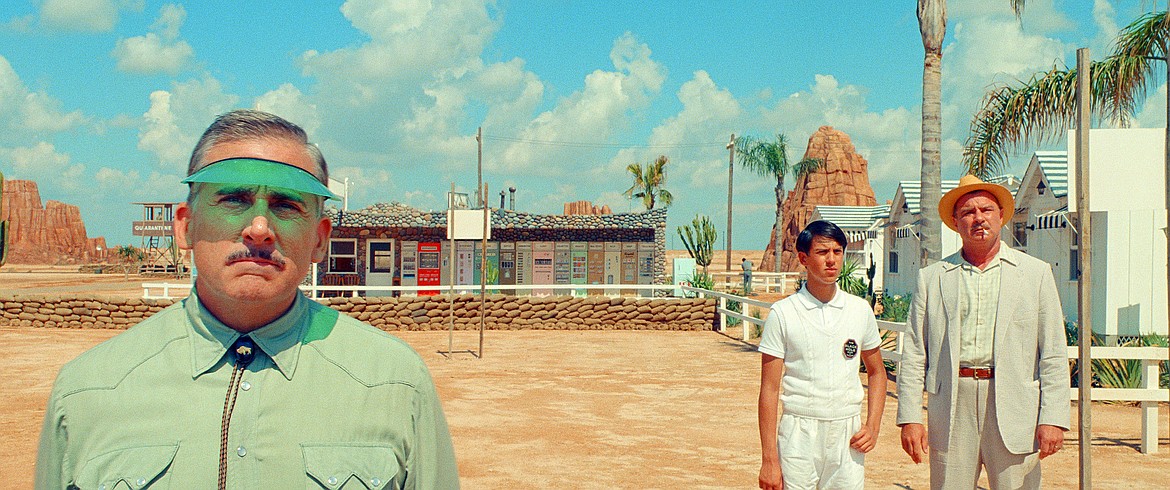 This image released by Focus Features shows Steve Carell, from left, Aristou Meehan and Liev Schreiber in a scene from "Asteroid City."