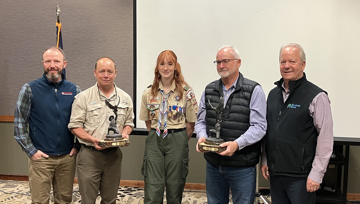 The Northwest District Montana Council Boy Scouts of America recognized Montana Fish, Wildlife and Parks and Flathead Electric Cooperative for their contributions to the community. From left to right, Andrew Sliter, who presented the awards, Dave Landstrom, Montana Fish, Wildlife and Parks; Eagle Scout Kaylee King, Troop 1941 Columbia Falls; Kim Souther, Flathead Electric Cooperative; and Joe Unterreiner with Glacier Bank.