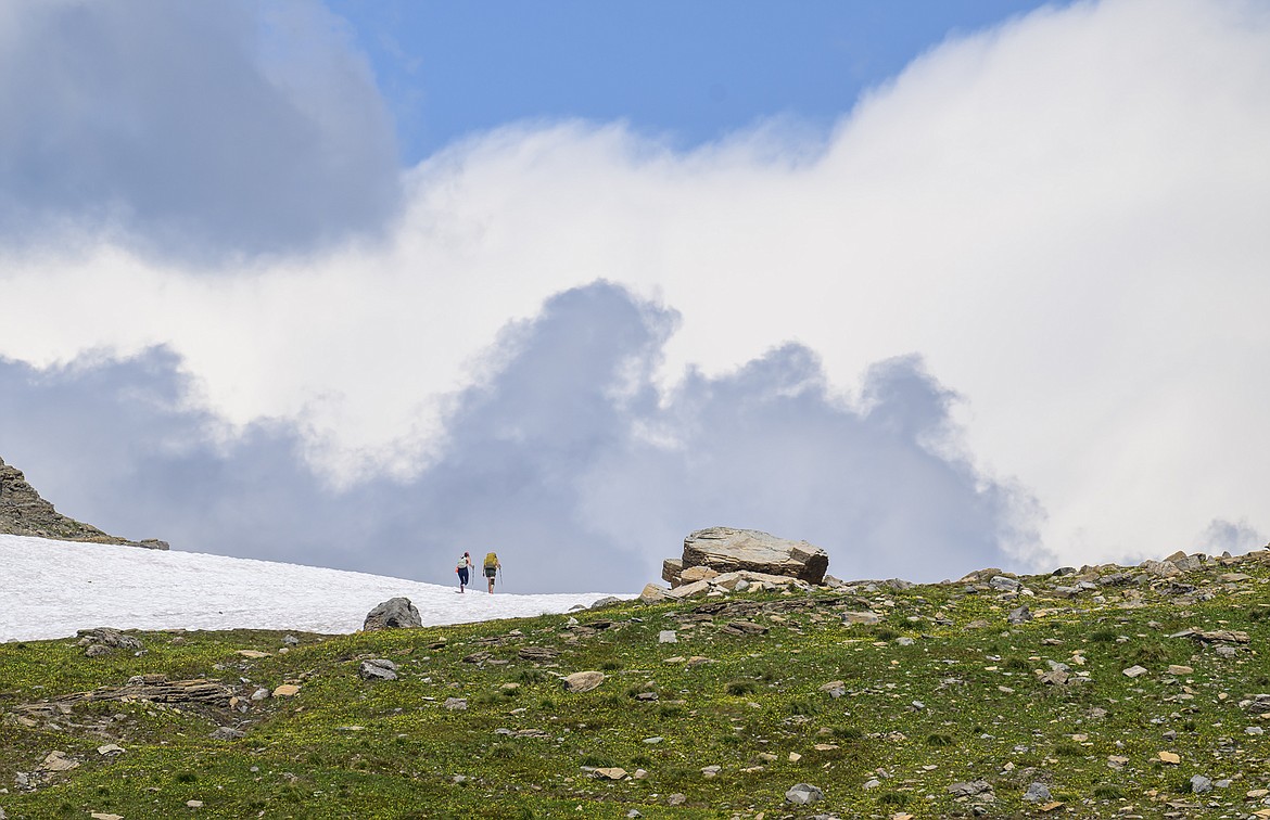 Hikers near Haystack Butte along the Highline Trail in Glacier National Park. (Chris Peterson/Hungry Horse News)