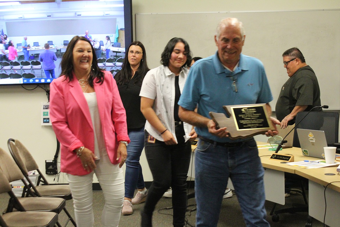 Quincy School Board members and North Central ESD Superintendent Michelle Price, left, assemble for a picture after Price presented the School Board of the Year award.