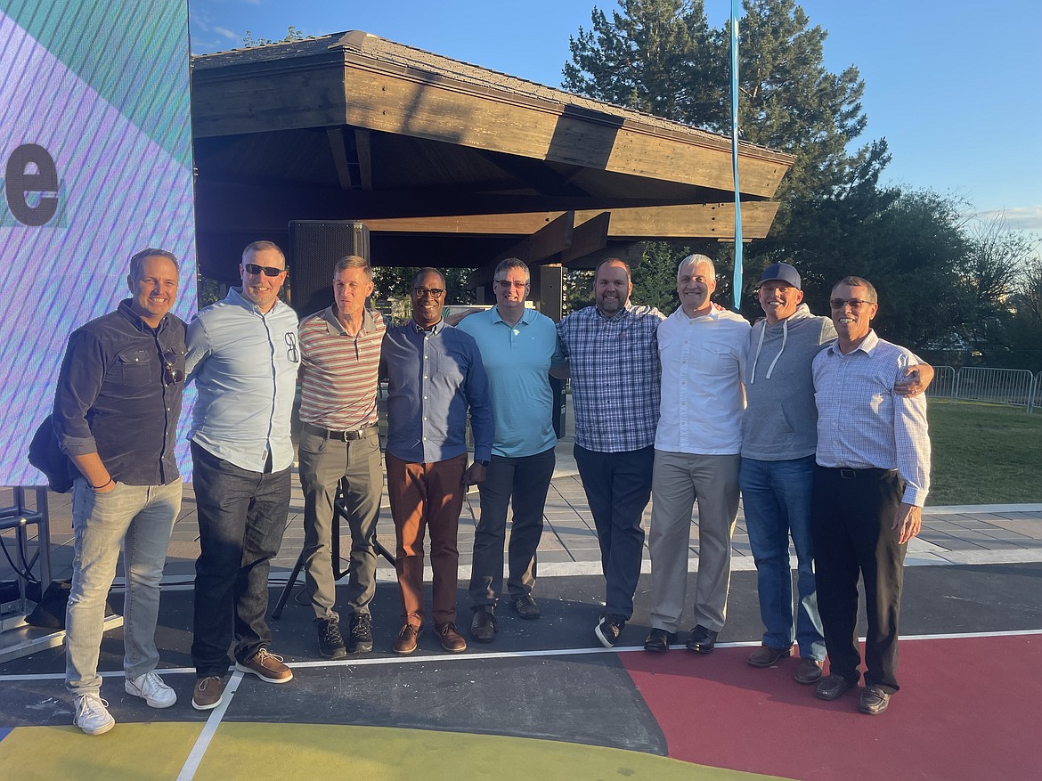 Photo courtesy JON ADAMS
Players and coaches from the 1995-96 Whitworth men's basketball team pose for a photo last week at Riverfront Park in Spokane as their team was inducted into the Hooptown USA Hall of Fame. From left are Jon Adams, Greg Jones, Jeff Arkills, Roman Wickers, Nate Dunham, John Beckman, Doug Schulz, Nate Williams and head coach Warren Friedrichs.