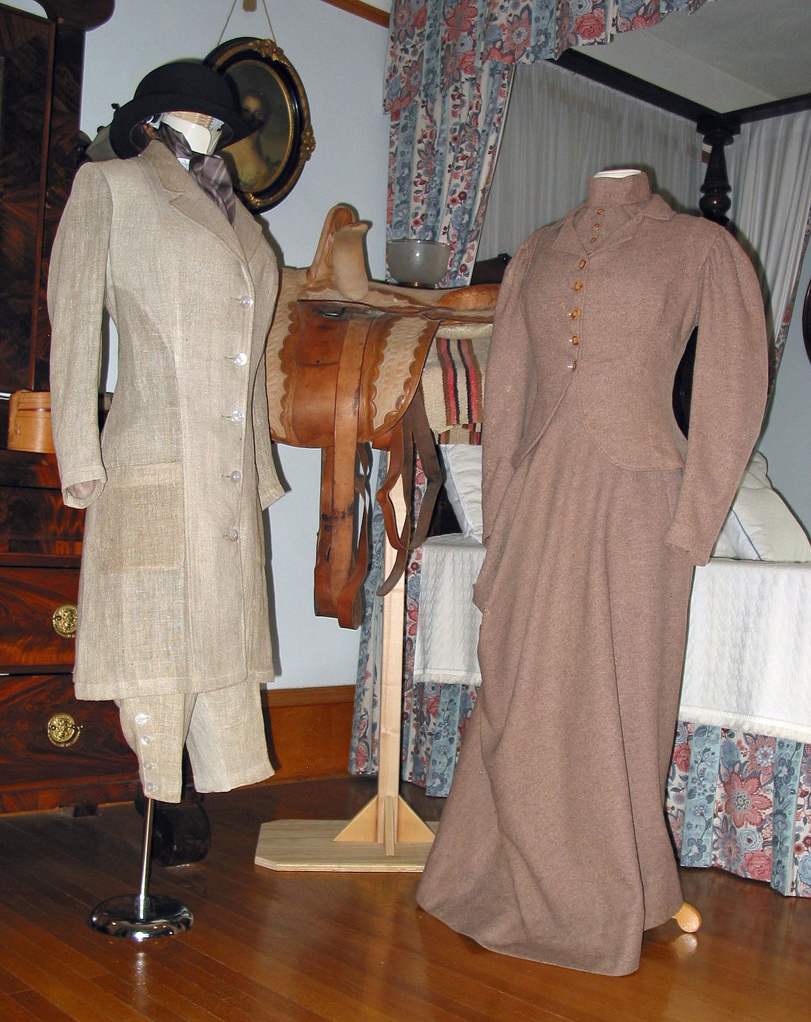 An example of a 1920 riding habit with riding breeches, left, and a 1895 riding habit for riding side saddle are displayed at the Conrad Mansion as part of the exhibit "Conrads at Play: Dress for Sports and Recreation 1880s-1960s."