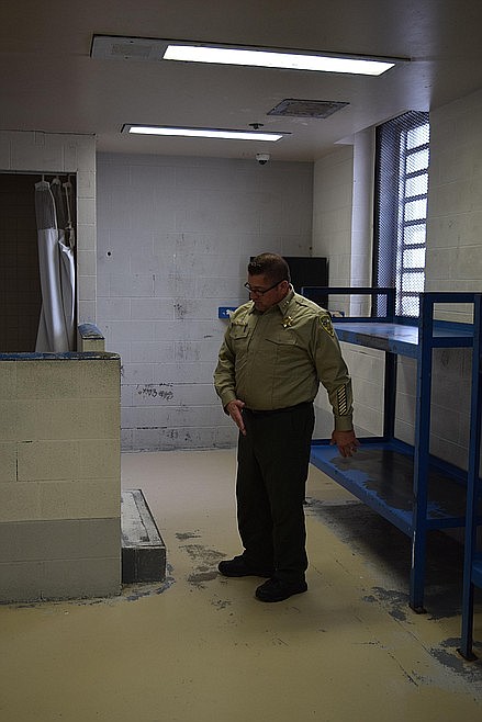 Adams County Sheriff Dale Wagner gives a tour of the cell in which Anthony Vargas-Martinez and former Corrections Deputy Rory Suarez-Tapia were assaulted by Ramon Reyna in June of last year. Reyna will be sentenced in the next few weeks.